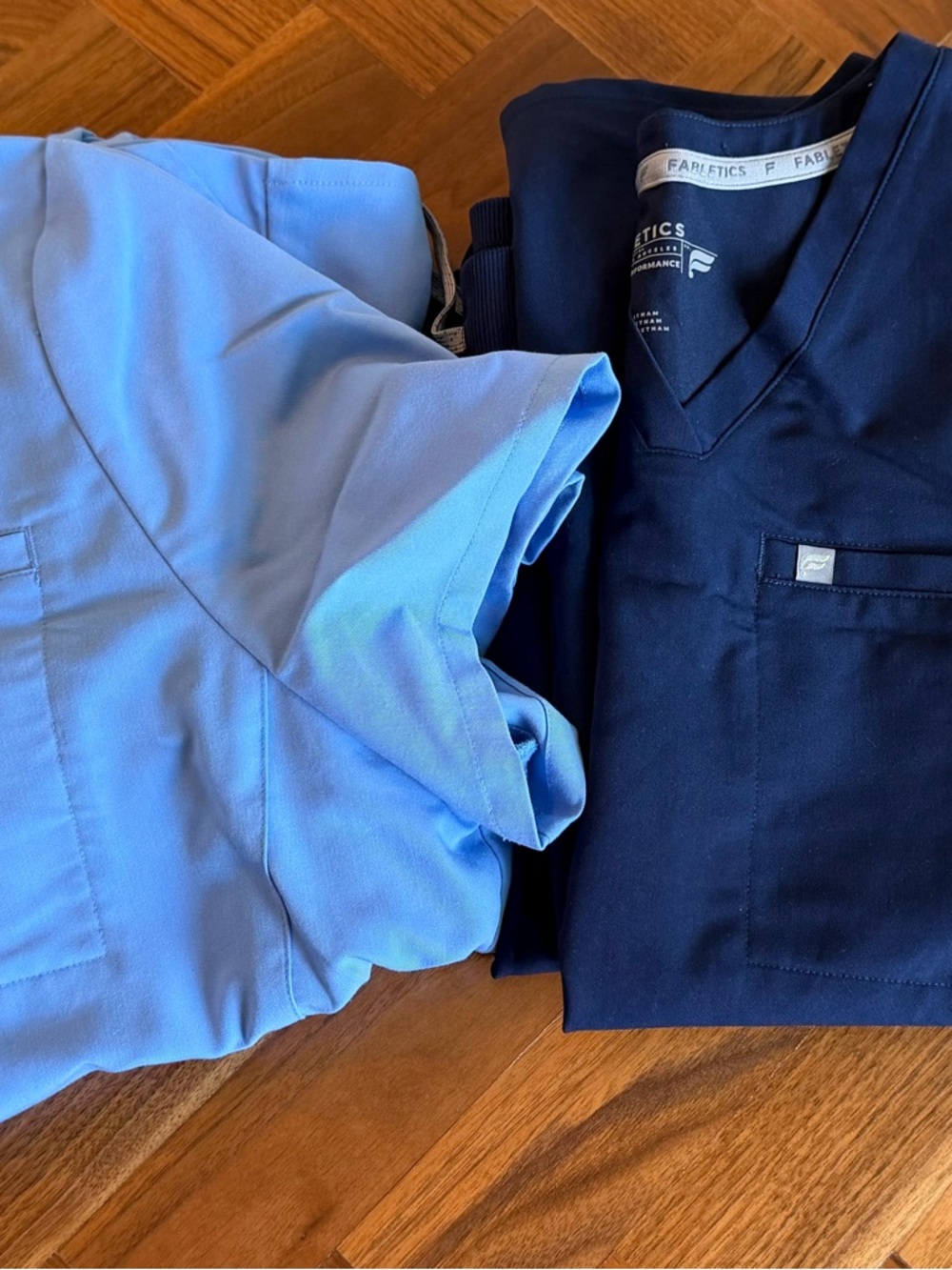 Set of Two Fabletics Women’s Scrubs (2XL top & XL bottoms)